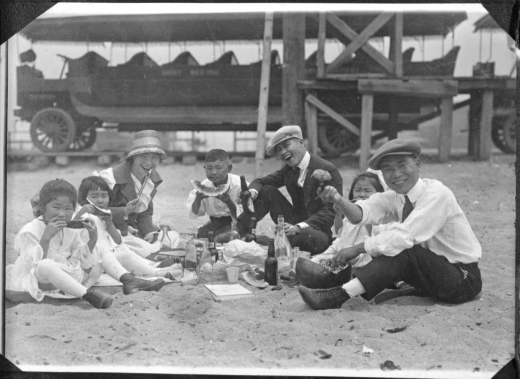 Historic photo of a family eating a picnic