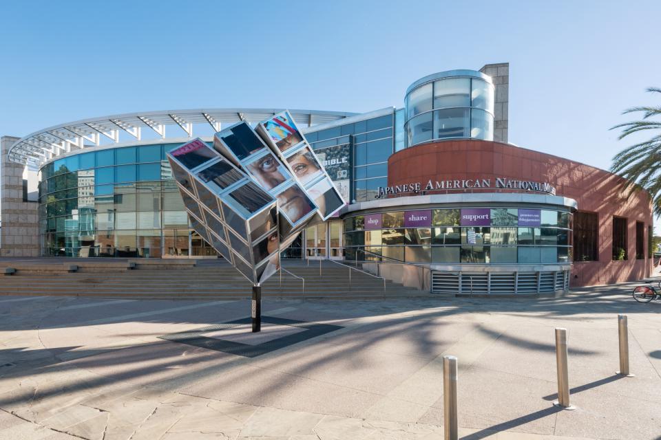 exterior shot of JANM pavilion with OOMO art cube on a sunny day