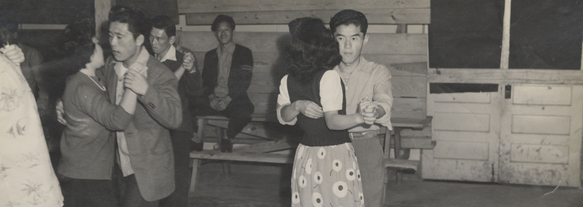 Black and white photograph of a school dance at Rohwer concentration camp (Gift of Mabel Rose Jamison (Jamie) Vogel).
