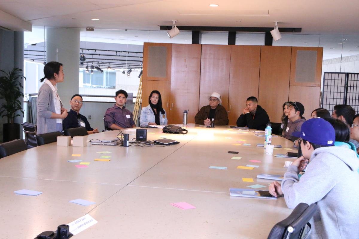 A group workshop held in the Yuki Board Room at the Japanese American National Museum.