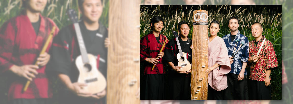 group photo of musicians holding instruments