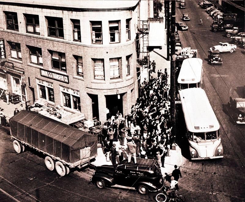 buddhist temple on 1st street with busses loading to take the japanese americans to the concentration camps