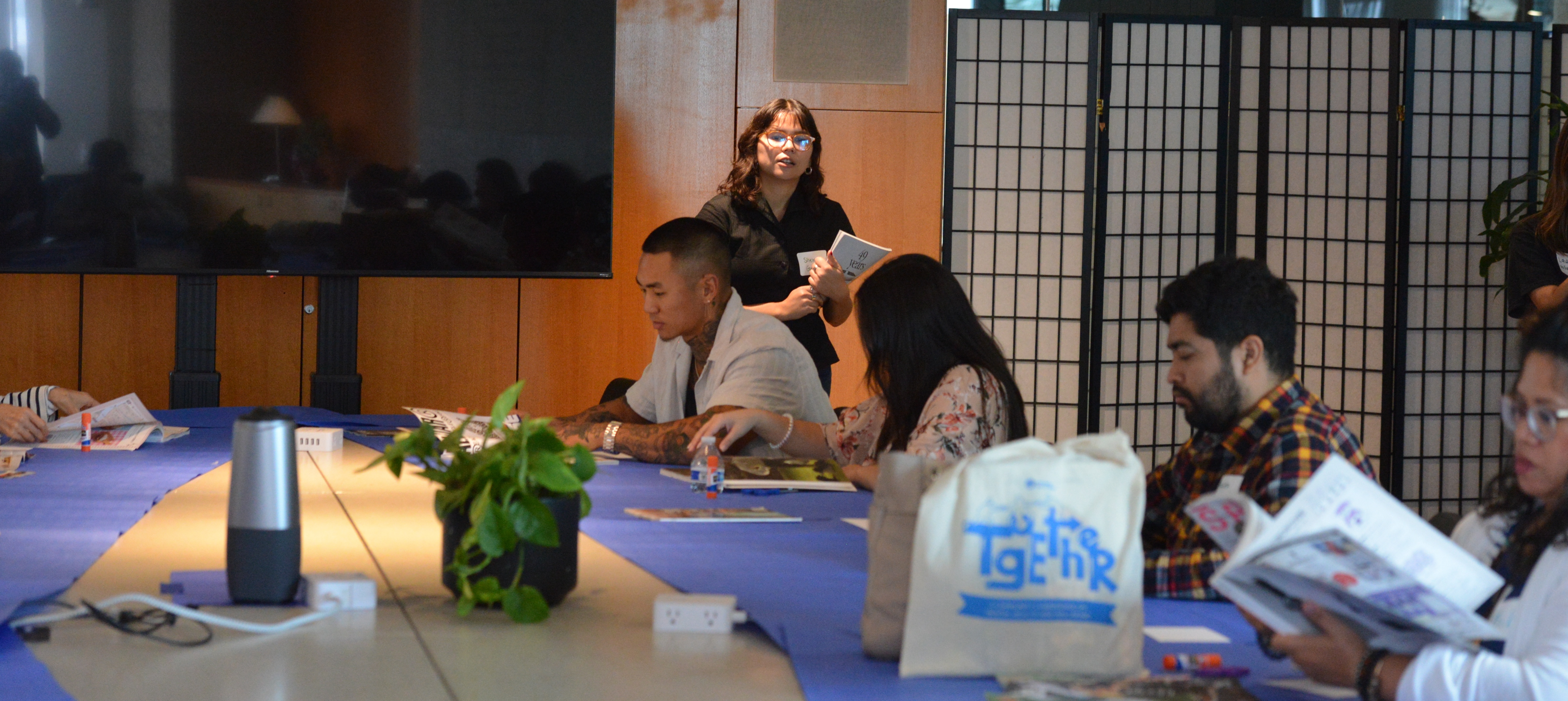 conference room with leader and attendees 