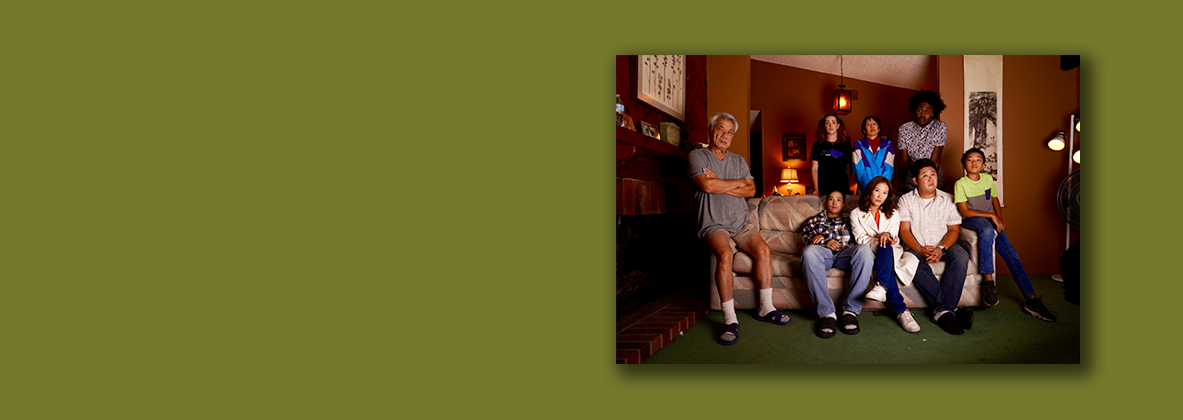 Movie still of family in living room