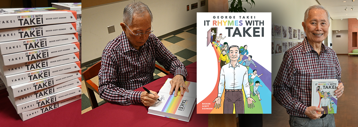 George Takei signing, hold his book