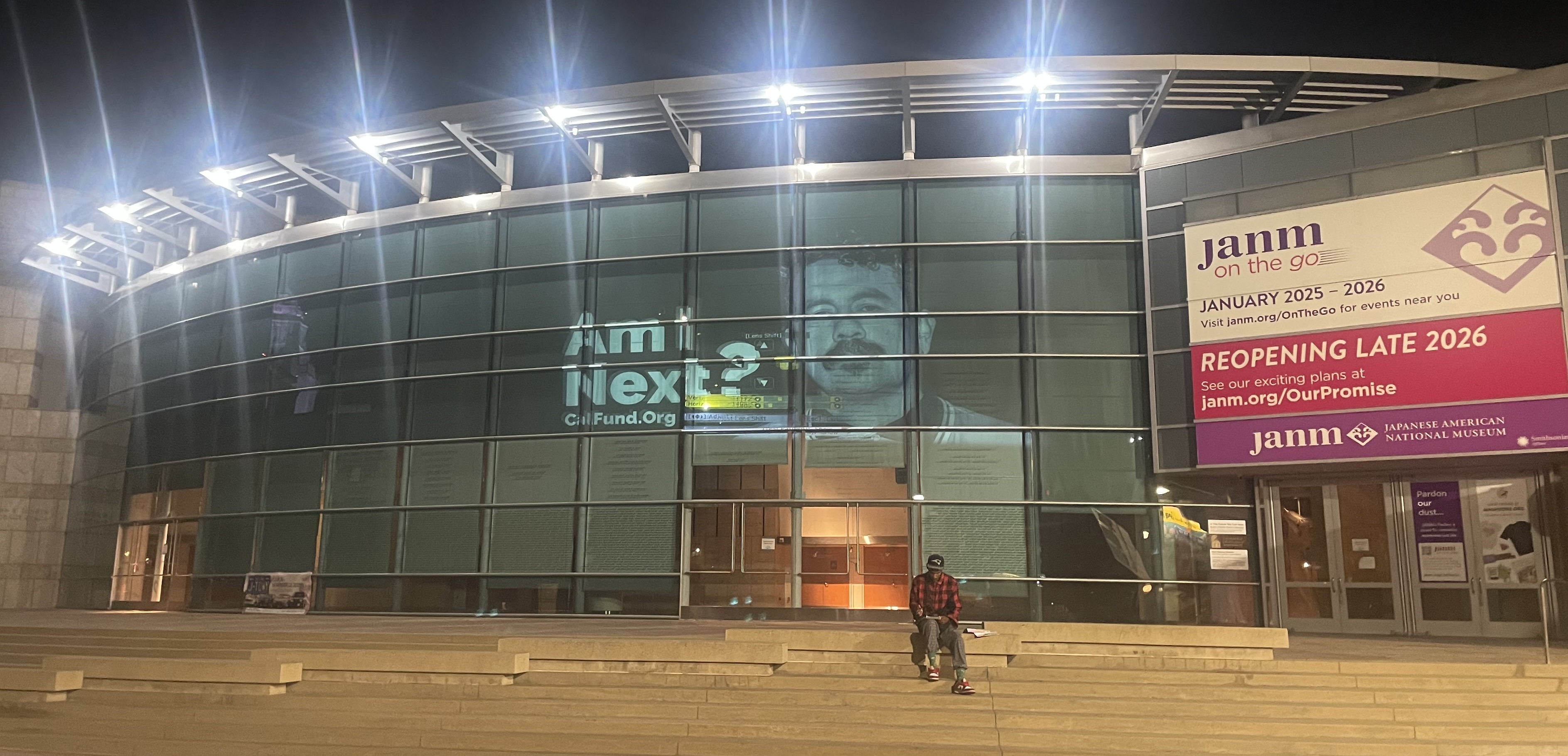 Am I next? projection of people taken away by ICE on museum building