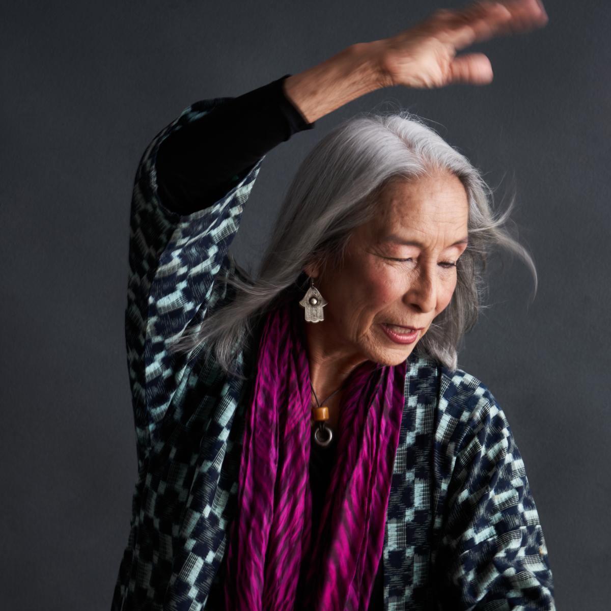 photo of Nobuko Miyamoto in front of a grey background