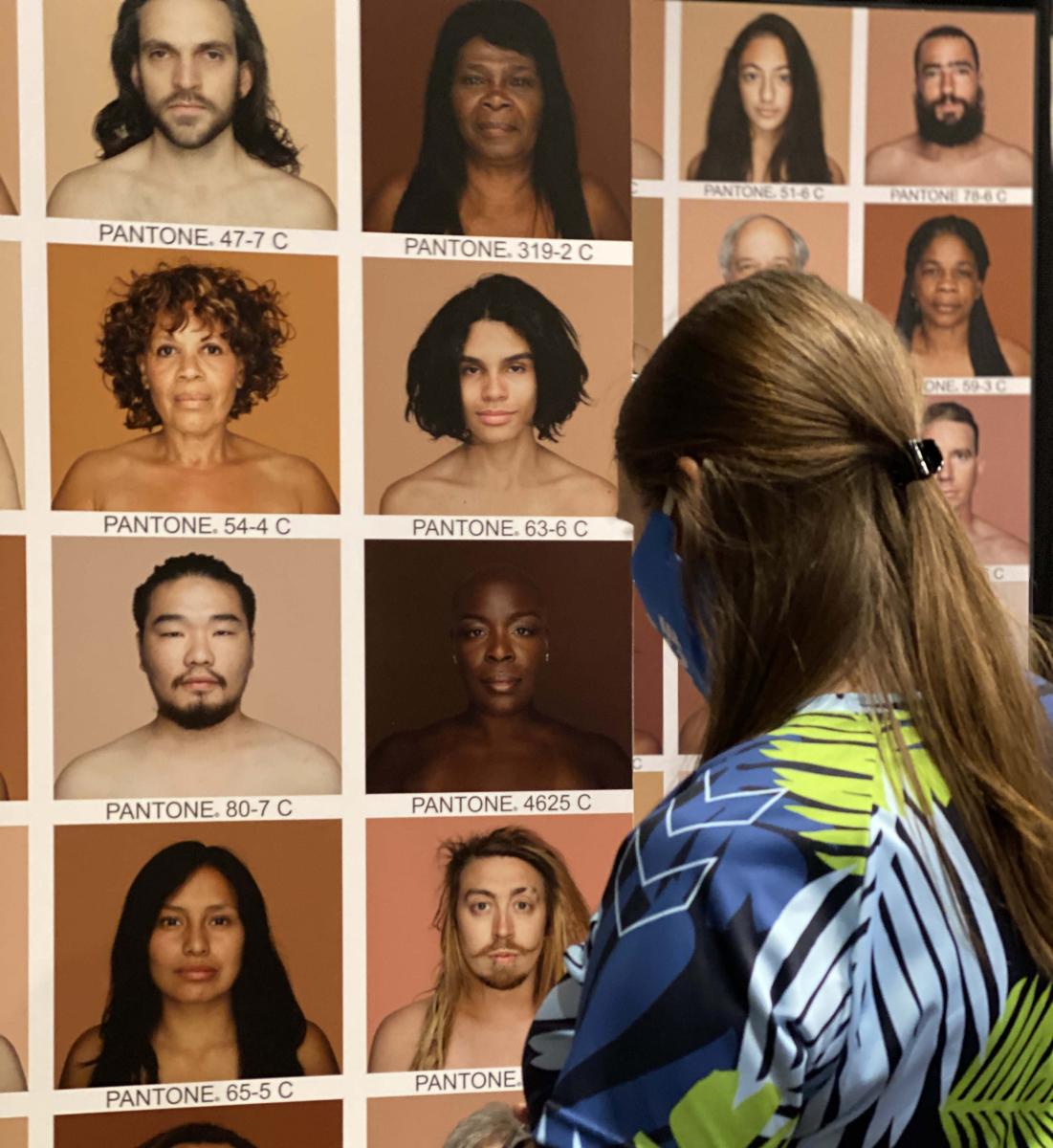 woman interacting looking at photos of people