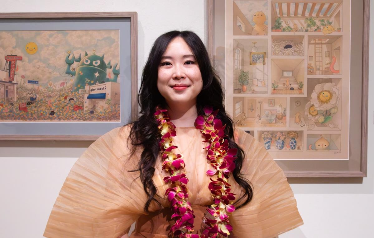 felicia chiao in front of her work