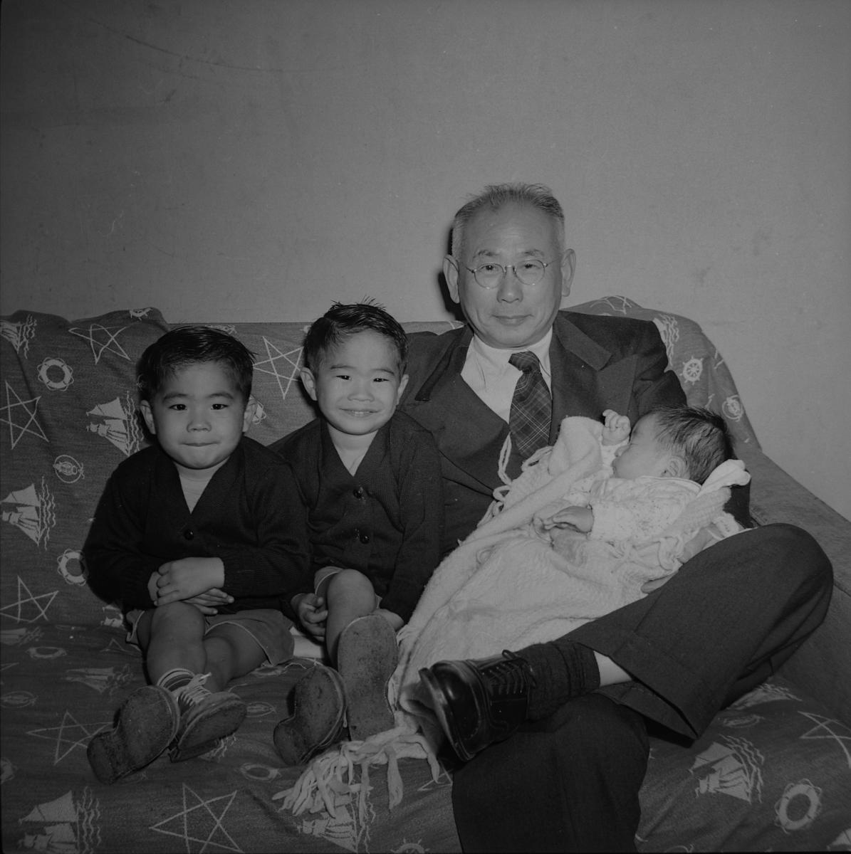 Chikashi Tanaka with grandkids Gregory, Graham and Timothy, ca. 1952.