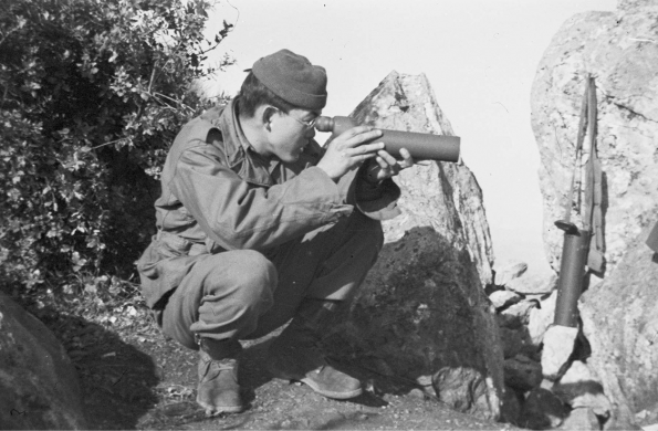 Technician Fifth Grade George "Langsam" Miyake during a field aberration party into the Maritime Alps.