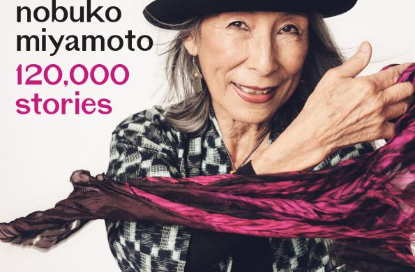 album cover of nobuko miyamoto wearing a black fedor and a fuschia scarf. Title reads, "Nobuko Miyamoto 120,000 stories"