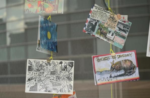 postcards display in window