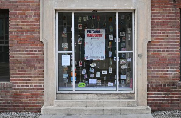 postcards display in window