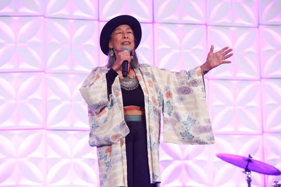 Nobuko Miyamoto singing on stage