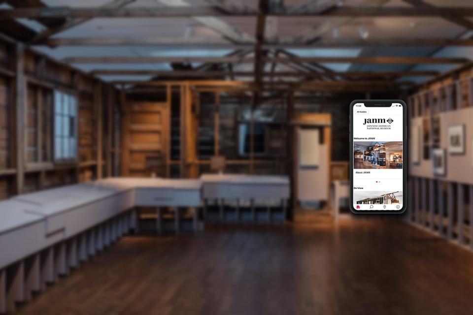 bloomberg app on phone in exhibit barrack