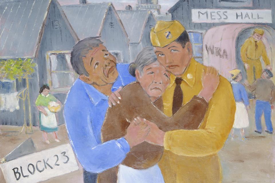 parents in camp hug son going off to war 