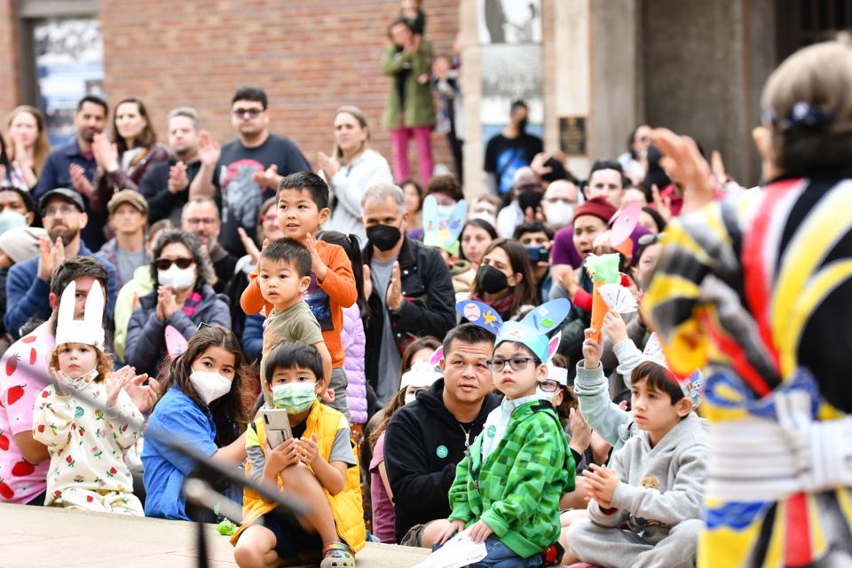 A crowd of children watching a Kodama Taiko performance at the 2023 Oshogatsu Family Festival on JANM's plaza