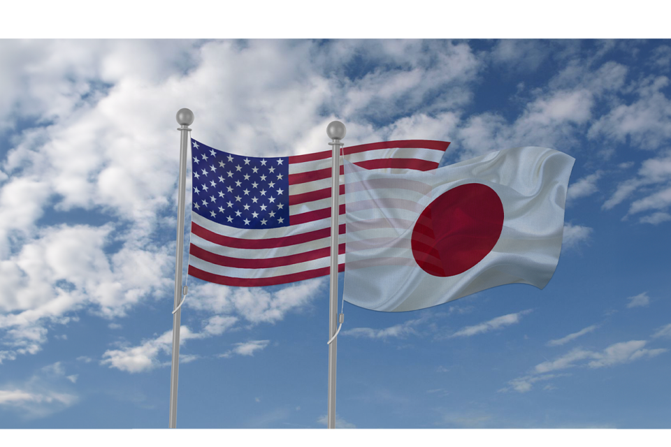 usa and japan flag waving n wind side by side