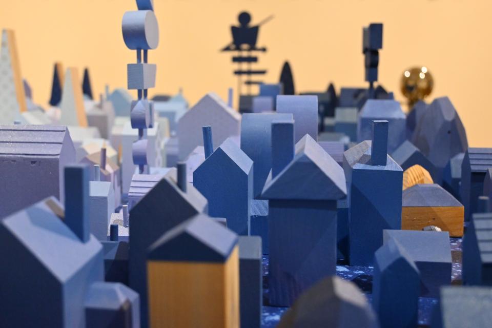 yoskay yamamoto city sculpture of wood