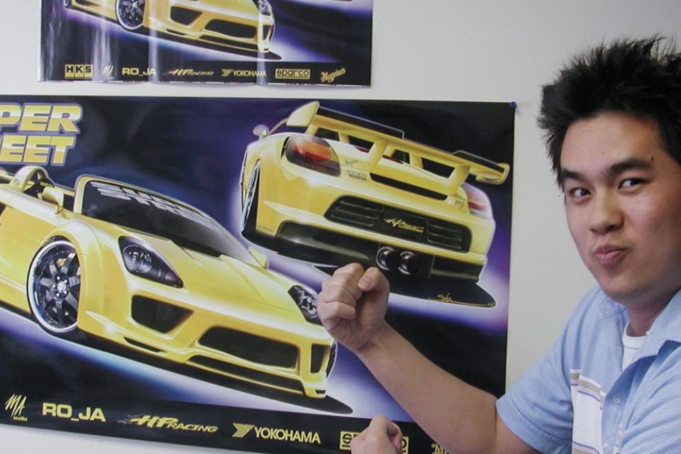 Jonathan Wong Motortrend magazine spread on wall