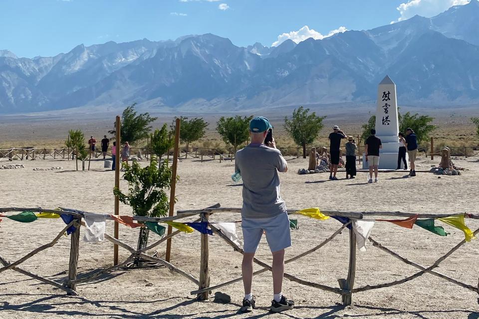 Visitors at Manzanar monument