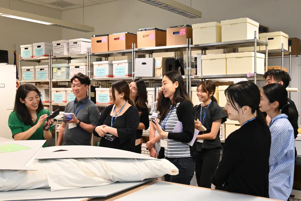 collections showing group of people museum artifacts