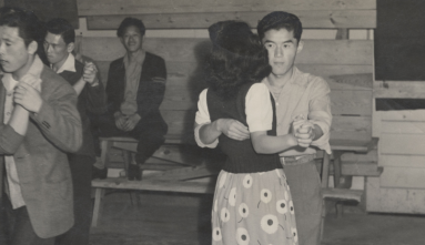 Black and white photograph of a school dance at Rohwer concentration camp (Gift of Mabel Rose Jamison (Jamie) Vogel).